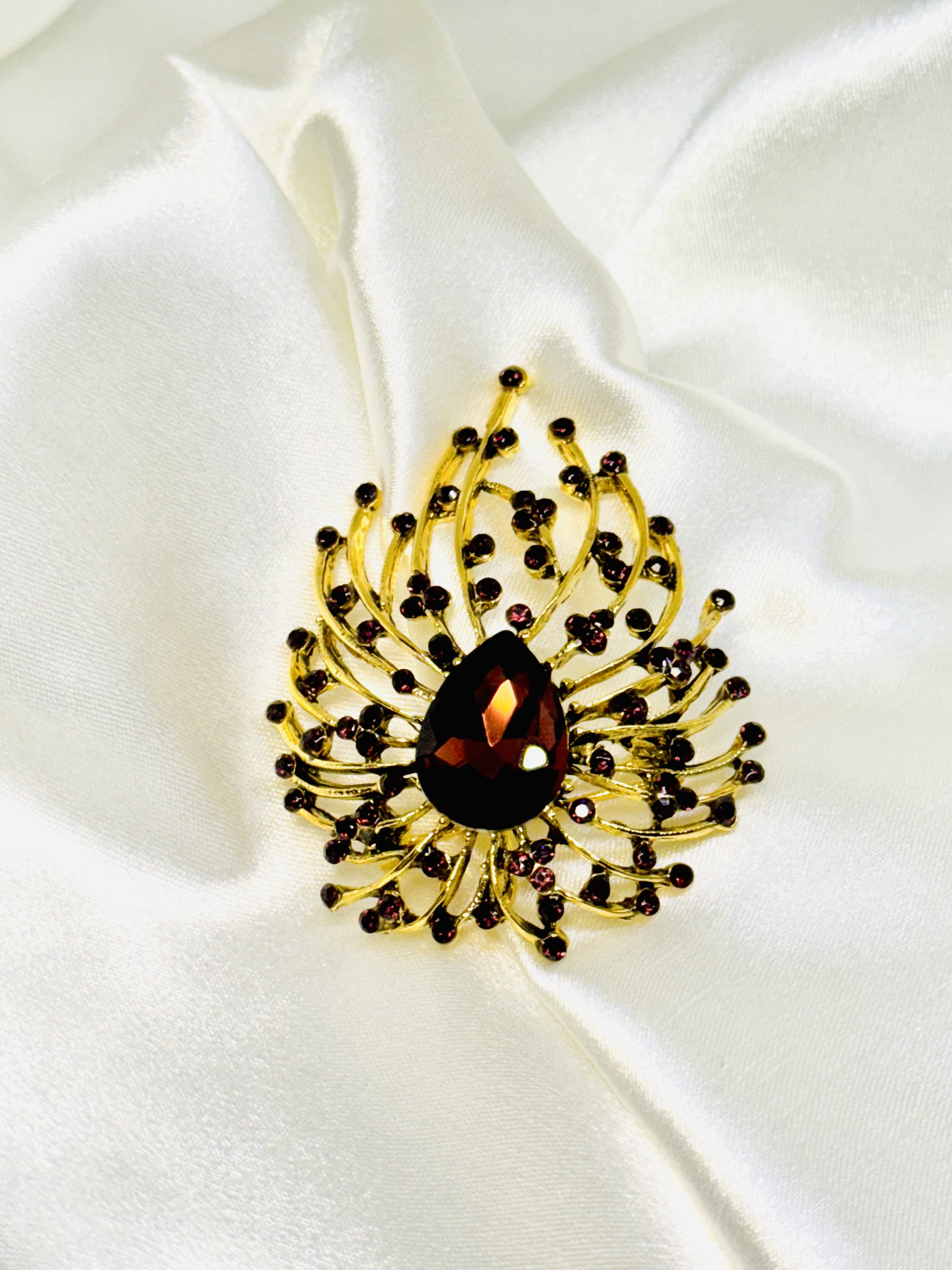 Broche pavo real