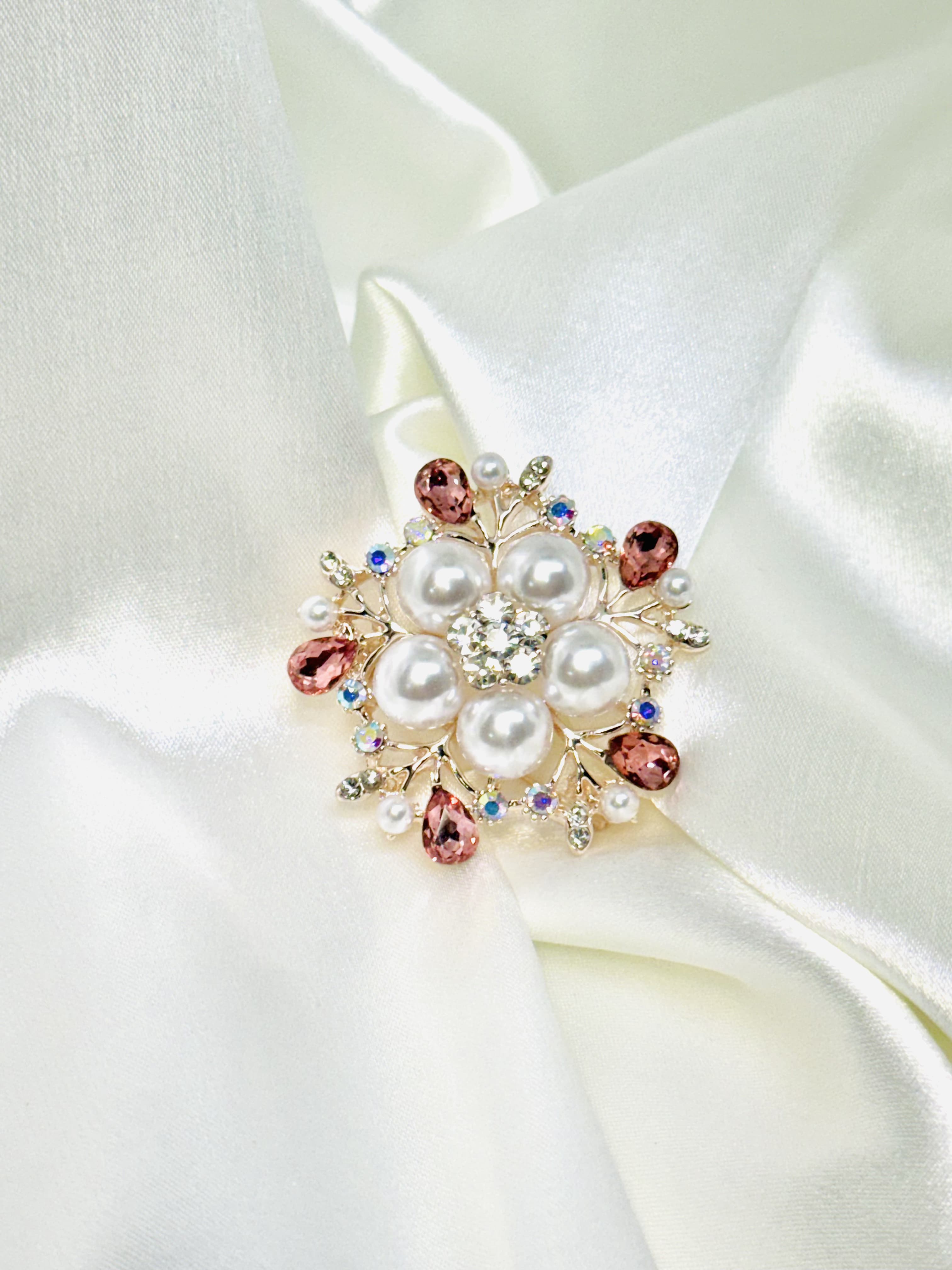 broche de perlas