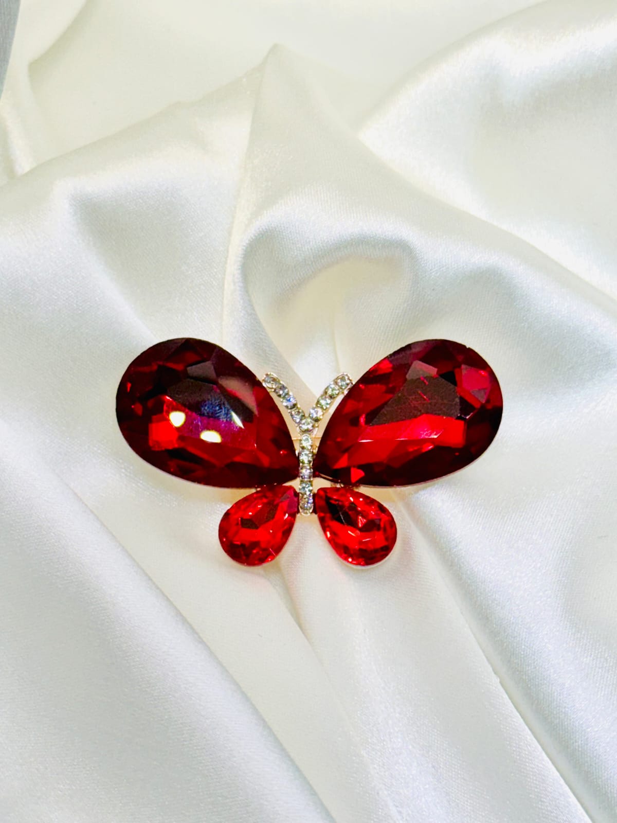broche mariposa roja