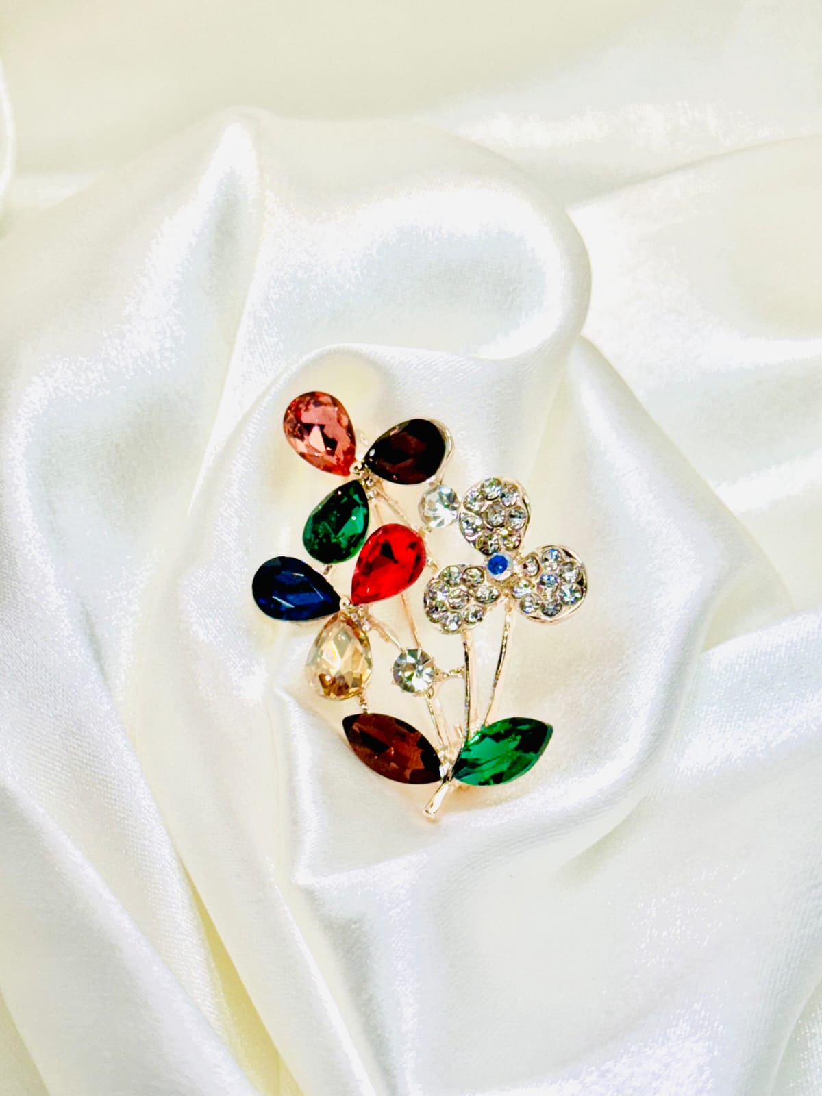 broche flores de colores