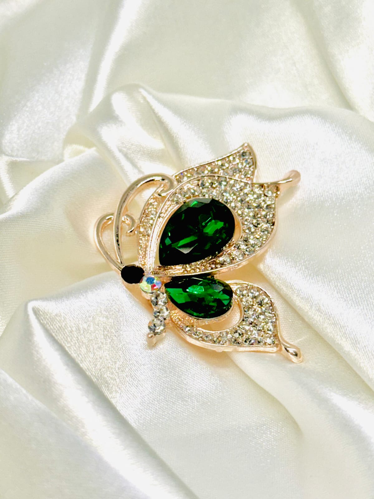 broche luz de ala