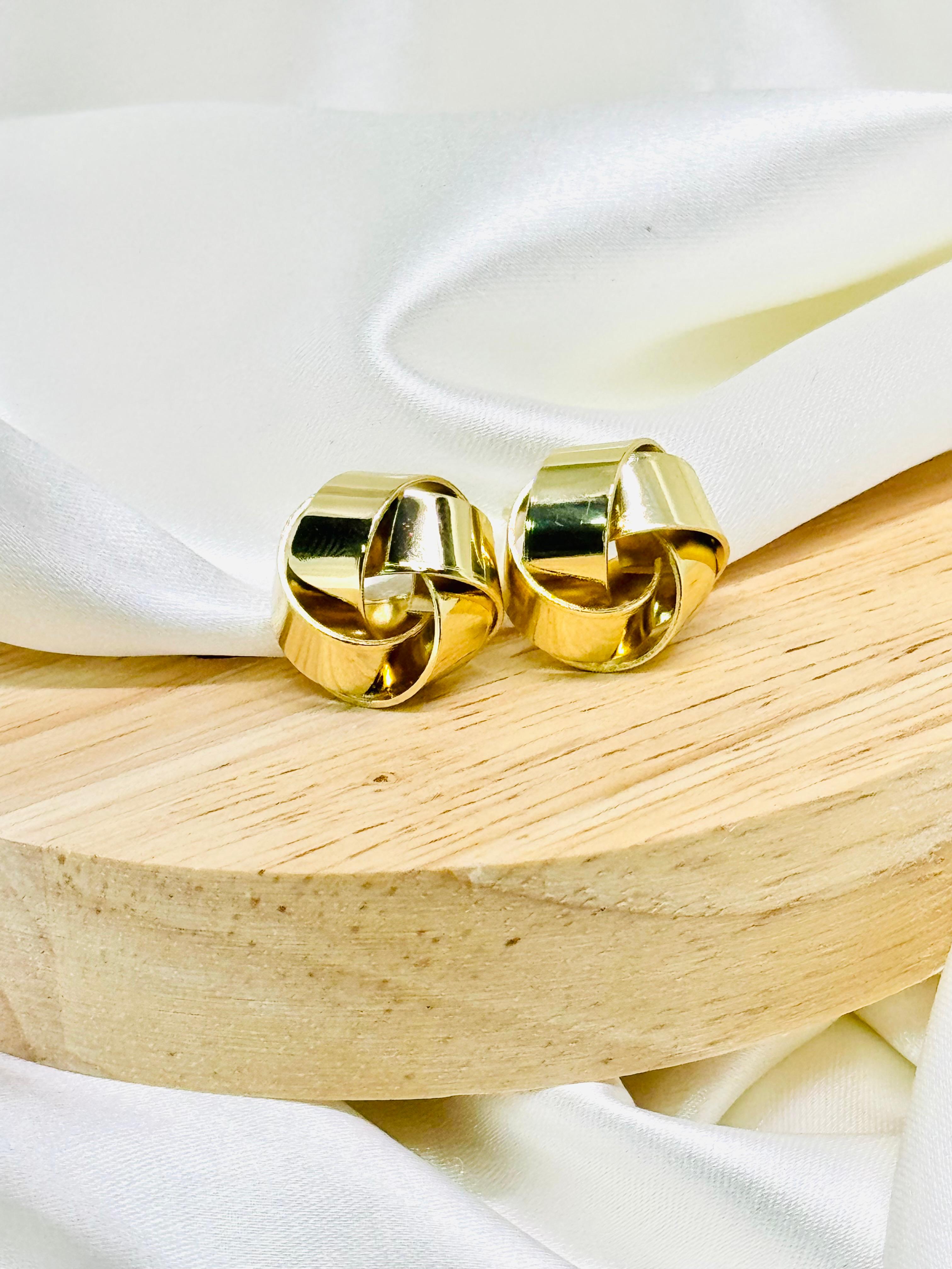 Aretes tipo nudo