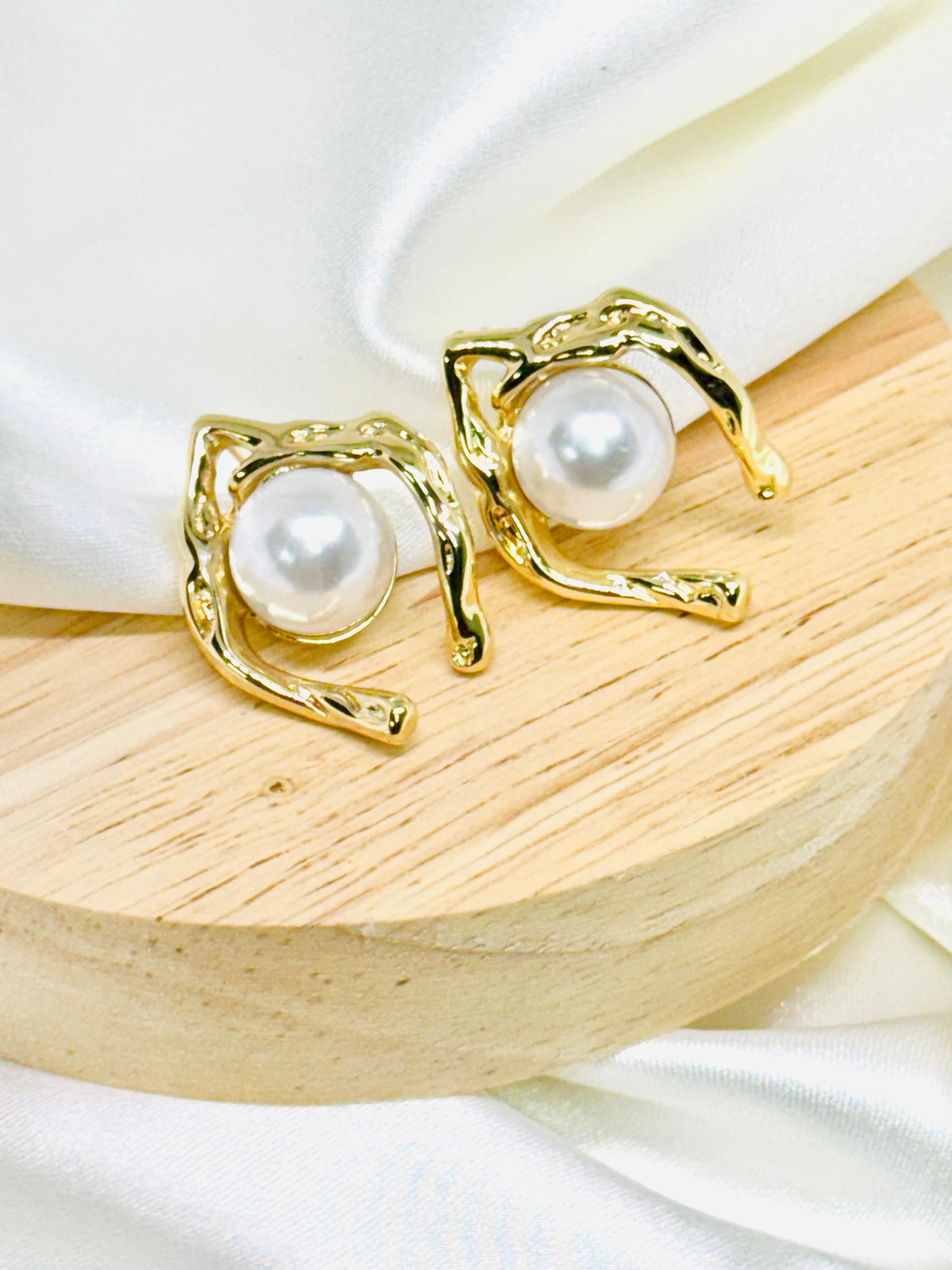 Aretes perlados