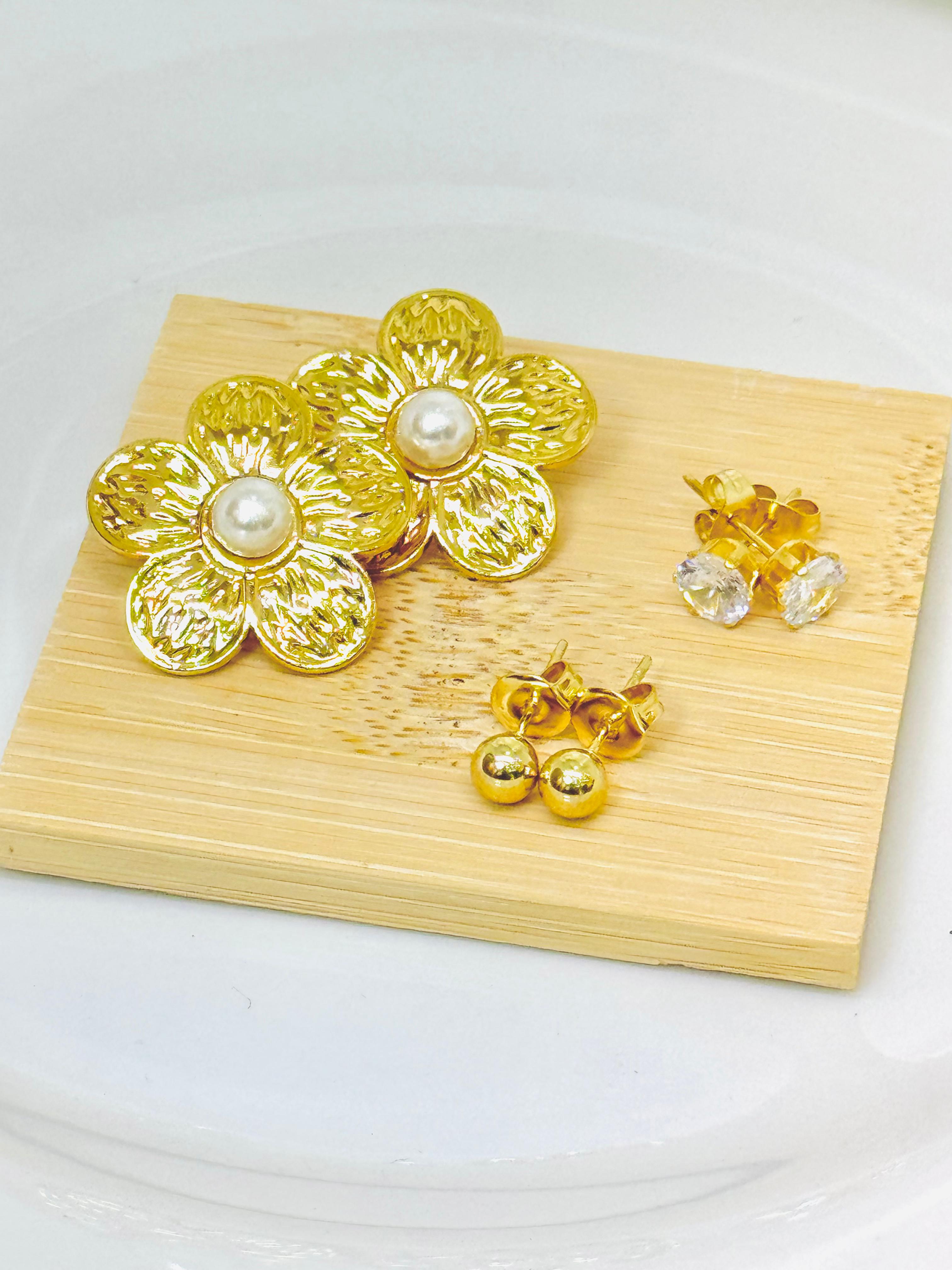 Aretes de trio