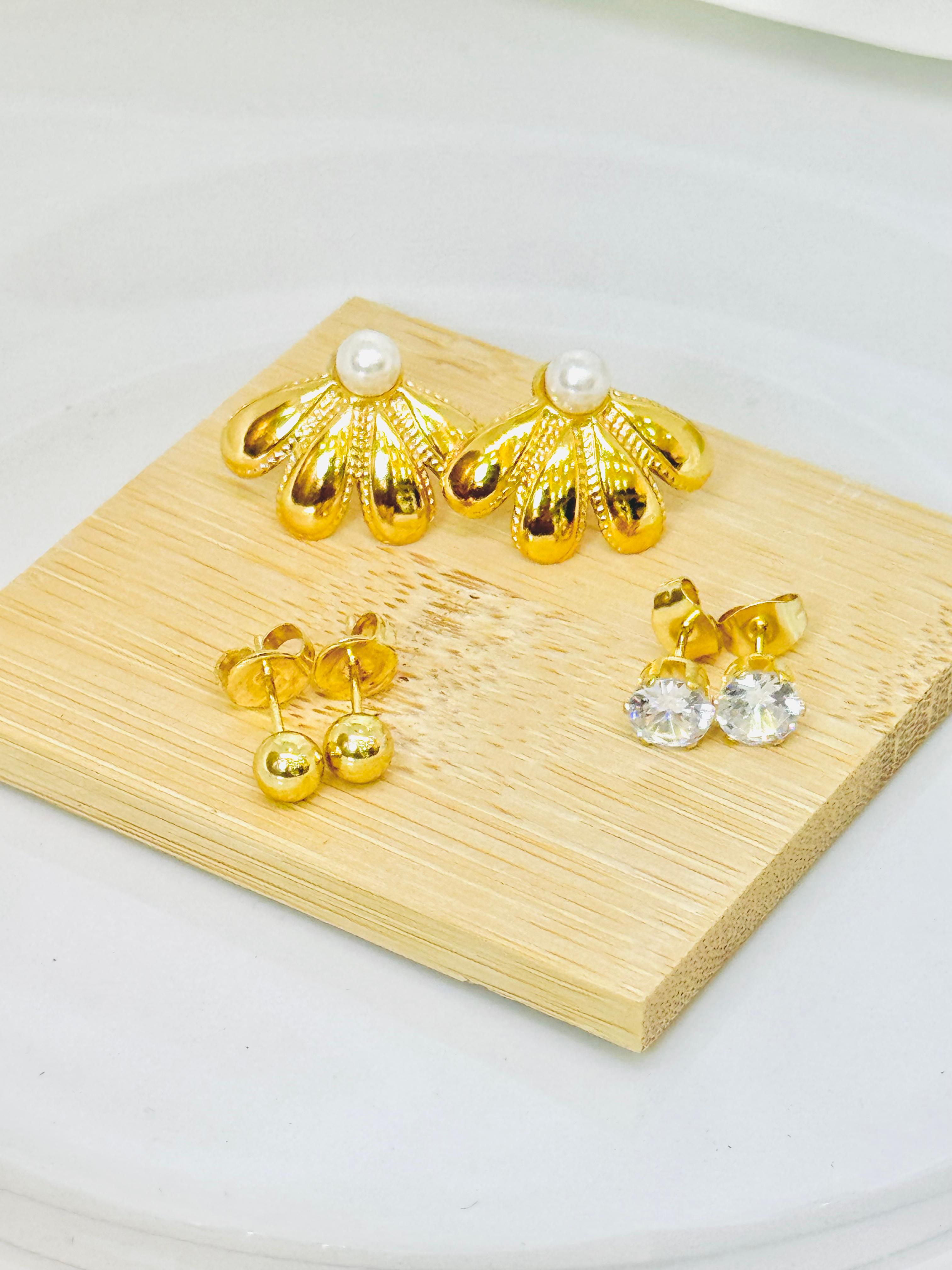 Aretes de trio