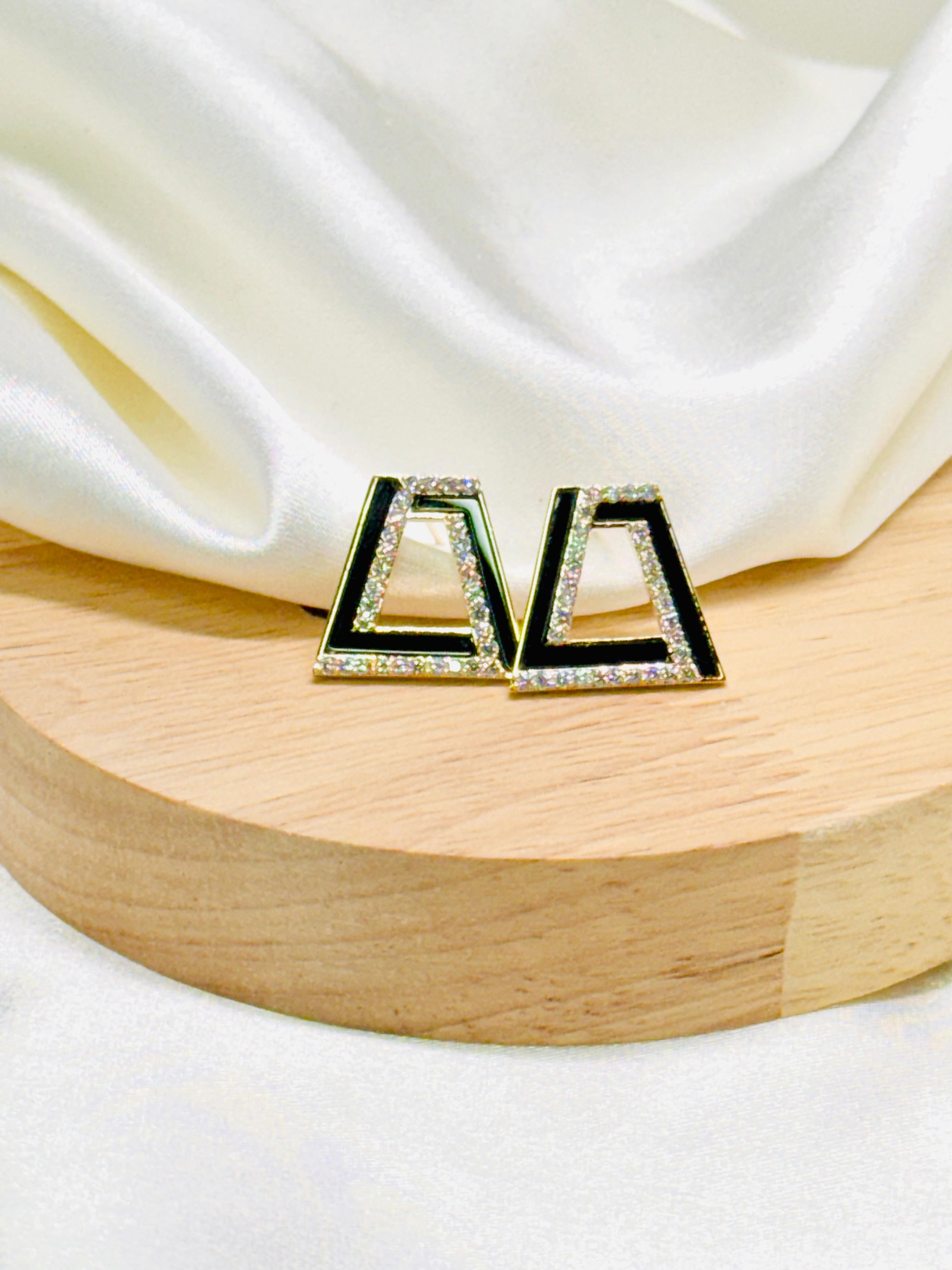 Aretes plateado rodio detalle negro