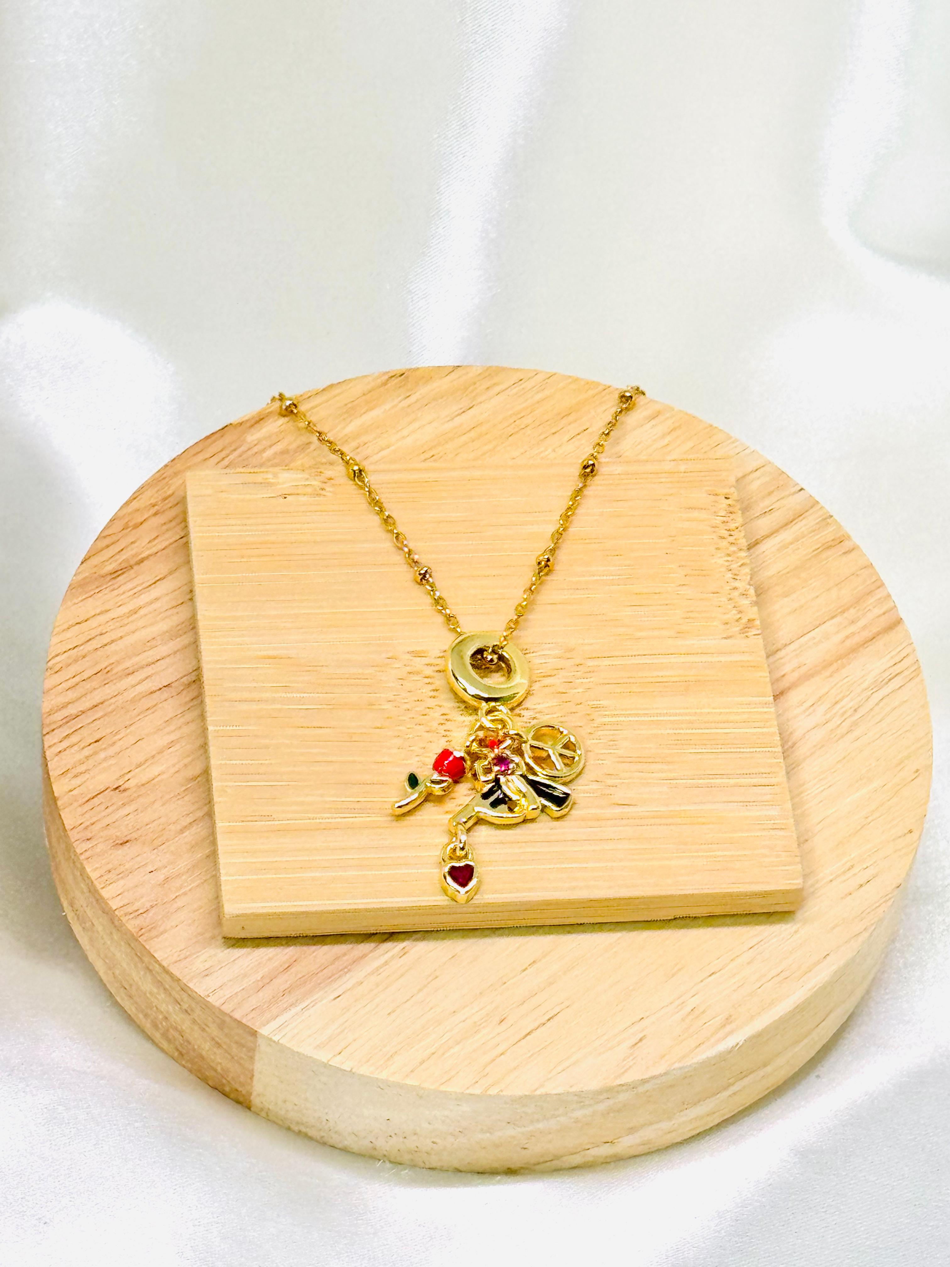 Collar dorado dijes roxy
